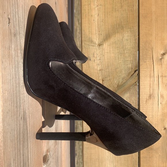 Black High-heel Closed Toed Shoe With Silver Detailing at top of Heel - Picture 2 of 4